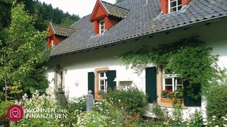 Haus im Grünen, das beispielhaft für mit Reallast belastete Grundstücke steht